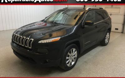 Photo of a 2014 Jeep Cherokee Limited 4WD Repairable Hail Damage for sale