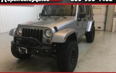 Photo of a 2013 Jeep Wrangler Unlimited Sahara 4WD Repaired Theft Damage for sale