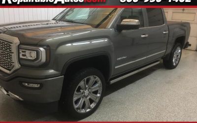 Photo of a 2017 GMC Sierra 1500 Denali Crew Cab 4WD Repaired Theft Damage for sale