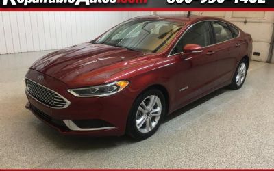 Photo of a 2018 Ford Fusion Hybrid SE Hybrid Repairable Hail Damage for sale